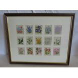 A framed group of 15 cards of woven flowers by J Wix and sons frame size 37.5cm x 36.5cm