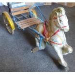A childs horse wheeled peddle trap mid 20th C  64cm in length horse height 55 cm