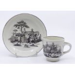 Worcester coffee cup and saucer decorated with a transfer prints of the tea party and maid with a