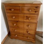 A 20th Century pine chest of drawers, two short over four drawers. ***Offsite Location***
