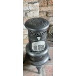 A 20th century fire fighters bucket; a Valor heater (2) ***Offsite Location***