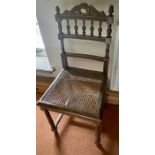 A pair of Edwardian cane seated hall chairs (2) ***Offsite Location***