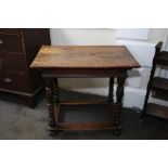 A late 17th Century Dutch oak and walnut small side table the rectangular top raised on four vase