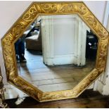 A 20th Century gilt octagonal mirror. 113cm H x 112cm W