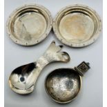 A pair of silver wine coasters, with celtic design, hallmarked Birmingham 1967 (gross weight for the