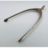 A hallmarked pair of sterling silver sugar tongs in the form of a wishbone.