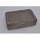 An early Victorian silver snuff box, London 1842 makers mark EE, rectangular engine turned lid