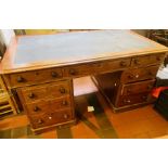 A Victorian mahogany twin pedestal desk, circa 1880, leather inlay writing surface with a moulded