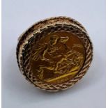 An 1895 Victorian half sovereign ring in a 9ct gold clip ring mount. Size L. Gross weight