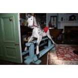 A carved and painted wood trestle rocking horse, 20th Century, dapple grey, 110cm(H) Condition: