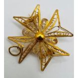 A yellow metal 375 stamped filigree Maltese cross brooch/pendant, gross weight approx 3.6 grams.