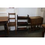 A 1930 oak three tier oak book trough, a child’s highchair circa 1930 and a drop flap table circa