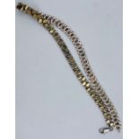 A 925 stamped gilt white metal art necklace. Gross weight 42.7 grams.