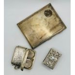 A selection of silver smoking paraphernalia comprising a patterned silver cigarette case, with a