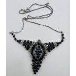 Handmade sapphire and diamond necklet in white metal. The stone set portion is stamped 585 and the