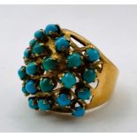 A turquoise set bombe ring, in yellow metal with Egyptian marks, Size K 1/2. Gross weight