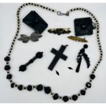 A collection of Victorian and later costume jewellery to include an early 20th century black and