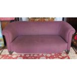 A 1930s sofa upholstered with a purple fabric , 70cm high x 1600cm long