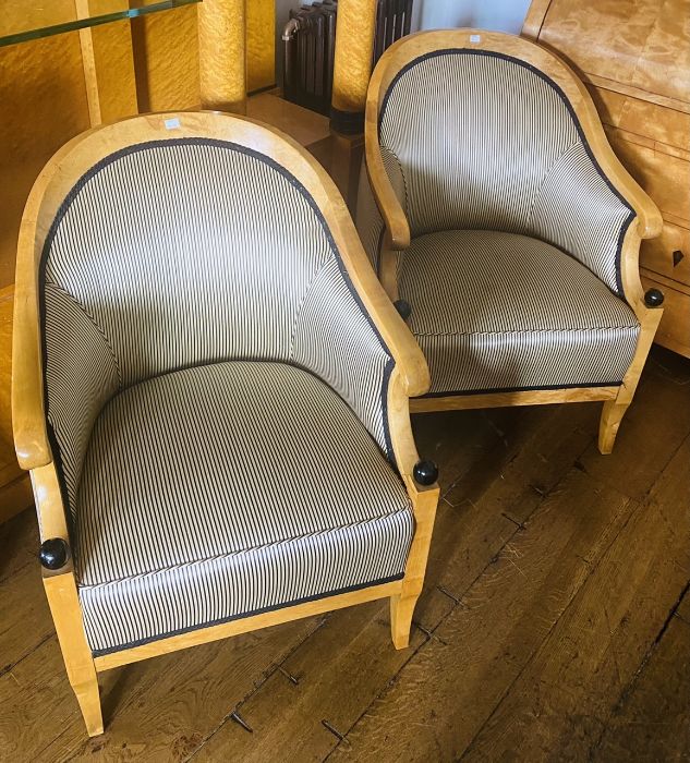 A pair of Biedermeier style satin birch tub chairs upholstered in striped fabric, the arms with