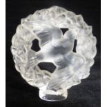 Pax Cachet, a contemporary Lalique frosted glass dove surrounded by a leafy garland, circular