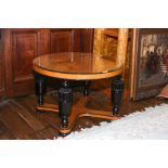 A Biedermeier style satin birch and ebonized occasional table with circular top on baluster turned