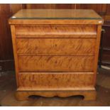 A Biedermeier satin birch chest with long shaped graduated drawer above three further drawers ,