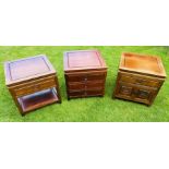Two Chinese hardwood bedside chests, one with three graduated drawers, another with drawer above a