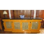 A Regency style satin birch sideboard with black marble top above four short frieze drawers and
