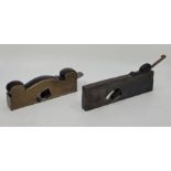 A steel soled brass shoulder plane, with ebony infill and wedge, Ward iron (small chip to cutting