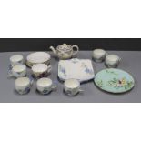 An Art Deco style Paragon china pattern X1345 ten piece tea set to include: cups, saucers, plates,