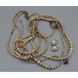 A selection of vintage pearl necklaces, largely simulated with odd cultured pearls in early 20th
