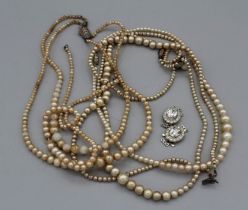 A selection of vintage pearl necklaces, largely simulated with odd cultured pearls in early 20th