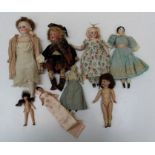 A collection of eight, mostly early 20th century bisque and porcelain dolls, including an Armand