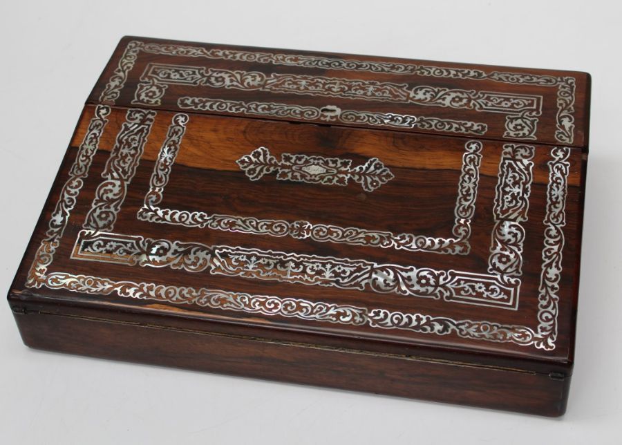 A Victorian lady's rosewood, mother of pearl inlaid writing slope, with double hinged top and twin