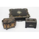 A Victorian papier mache shaped rectangular slope front writing box, the cover inlaid with mother-