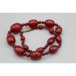 A cherry bead necklace, believed to be bakelite, approx 68cm in length, gross weight approx 97gm,