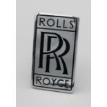 A Pre war chrome and black enamel Rolls Royce radiator badge, height 7cm