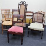 A mixed lot of seating furniture, including a cane back armchair, pair of crown back bedroom chairs,