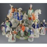 A group of largely Victorian Staffordshire figures. To include: Britain's Glory, Garibaldi and