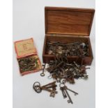 A comprehensive collection of 19th Century and later cast iron keys together with various gilt metal