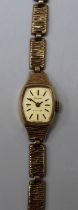 A 1960's lady's 9ct gold cased Tissot wristwatch, case numbered 75001.Seventeen jewel movement