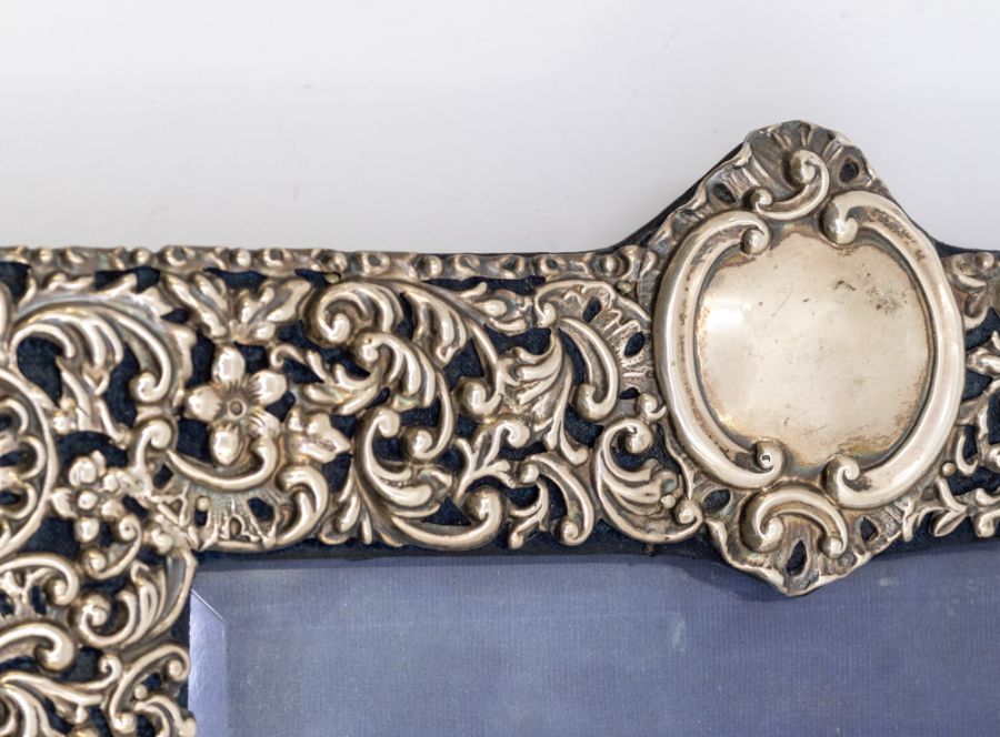 A large Victorian silver pierced frame, with central vacant cartouche, profusely chased and - Image 2 of 7