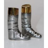 A pair of heavy gauge silver and silver gilt condiments in the form of textured riding boots, London