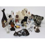 Four Winstanley studio pottery cats, together with various Nao and other figurines, Victorian bisque