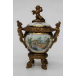 An 18th Century style ormolu mounted porcelain ink pot and cover, ovoid cobalt blue body painted