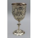 A 19th century silver goblet, the bowl decorated with floral swags, rural and marine landscape
