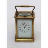 An early 20th century brass, five glass carriage clock with eight day gong striking repeating