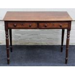 An early 19th century mahogany side table, the rectangular top over a pair of frieze drawers with