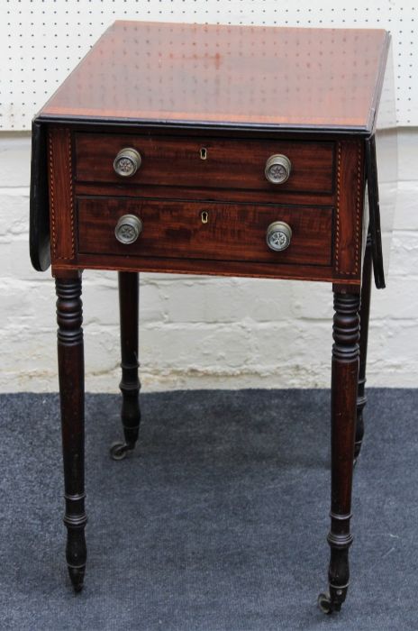 An early 19th mahogany, satinwood banded and chequer strung work table, the rectangular top and twin