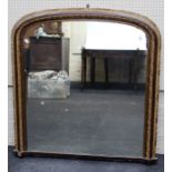 A 19th century style overmantle mirror, the gilt composite and simulated burr wood frame enclosing a